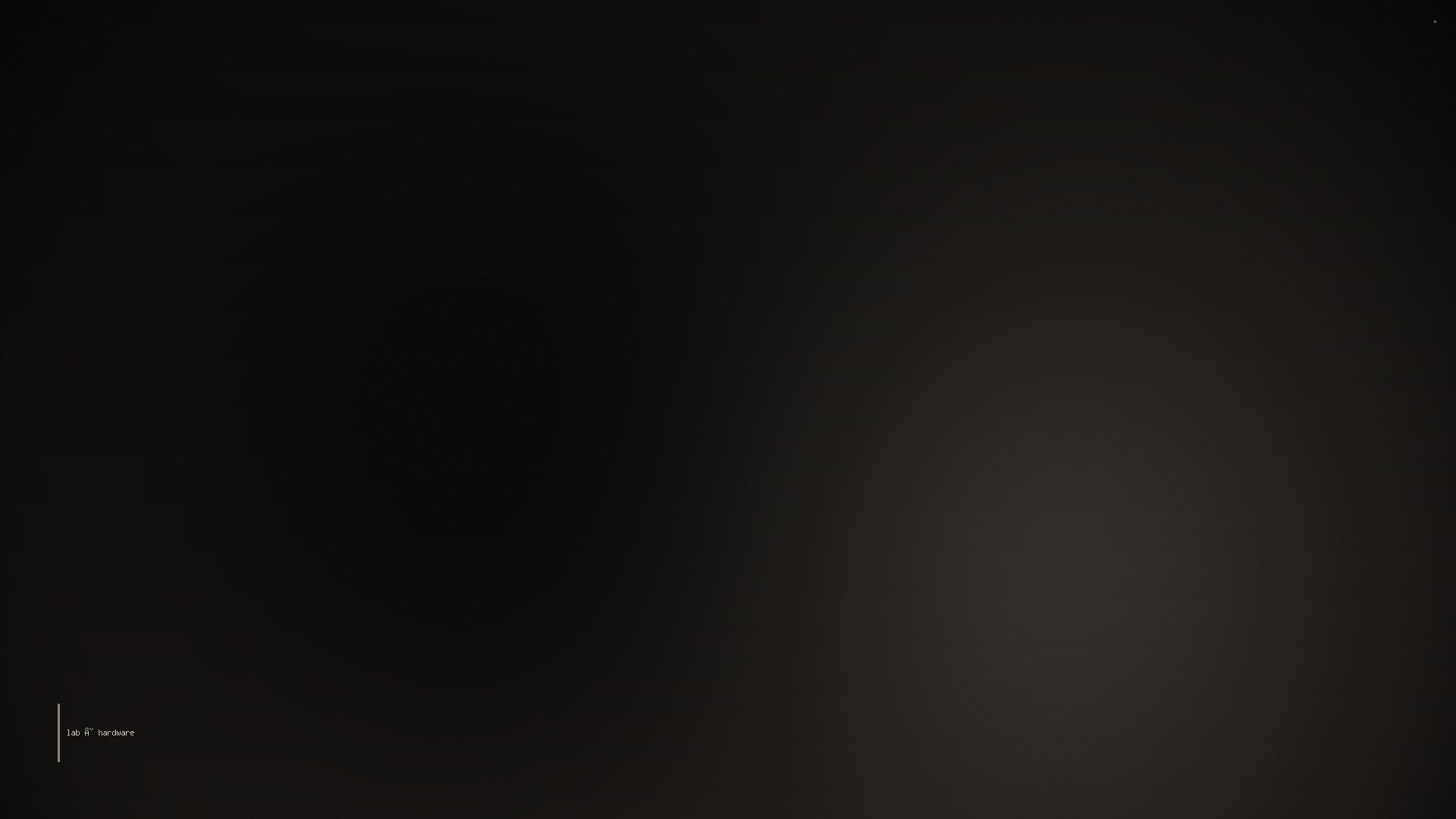 a graphite editorial frame suggesting a quiet workstation under directional light